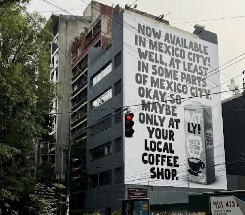 A billboard in Roma Norte advertising Oatly oat milk in English